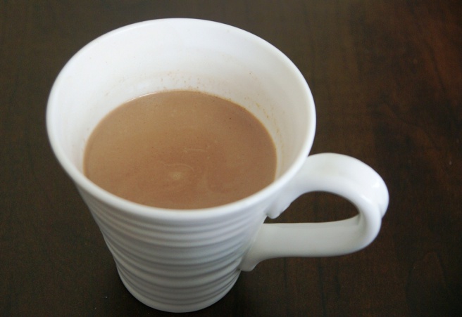 A steaming cup of hot cocoa